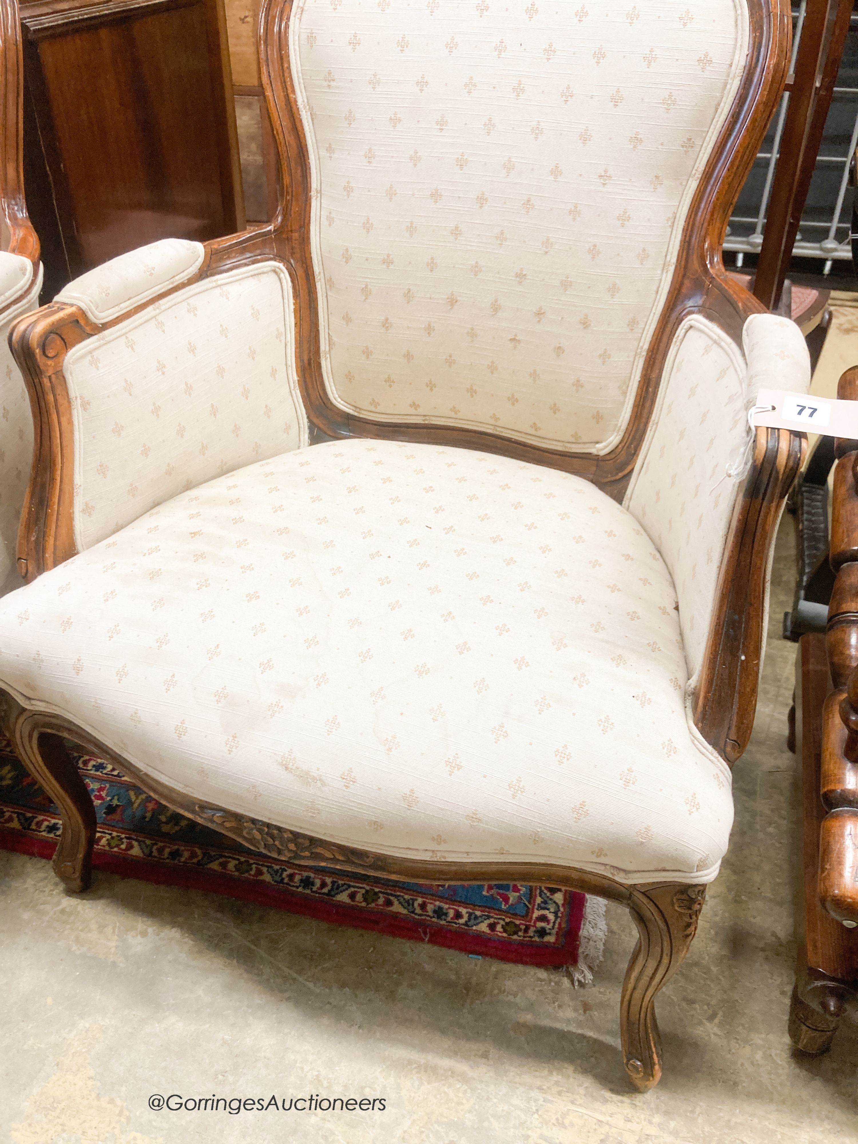 A pair of Louis XV style mahogany fauteuils, width 66cm, depth 55cm, height 94cm